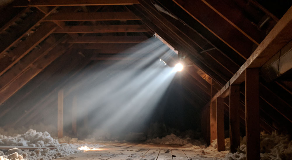 water stains on roof boards during attic inspection