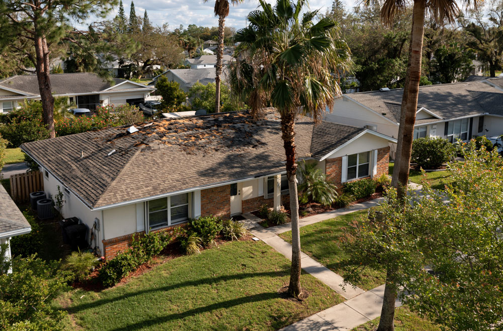 roof repair vs replacement decision Orlando FL home with storm damage